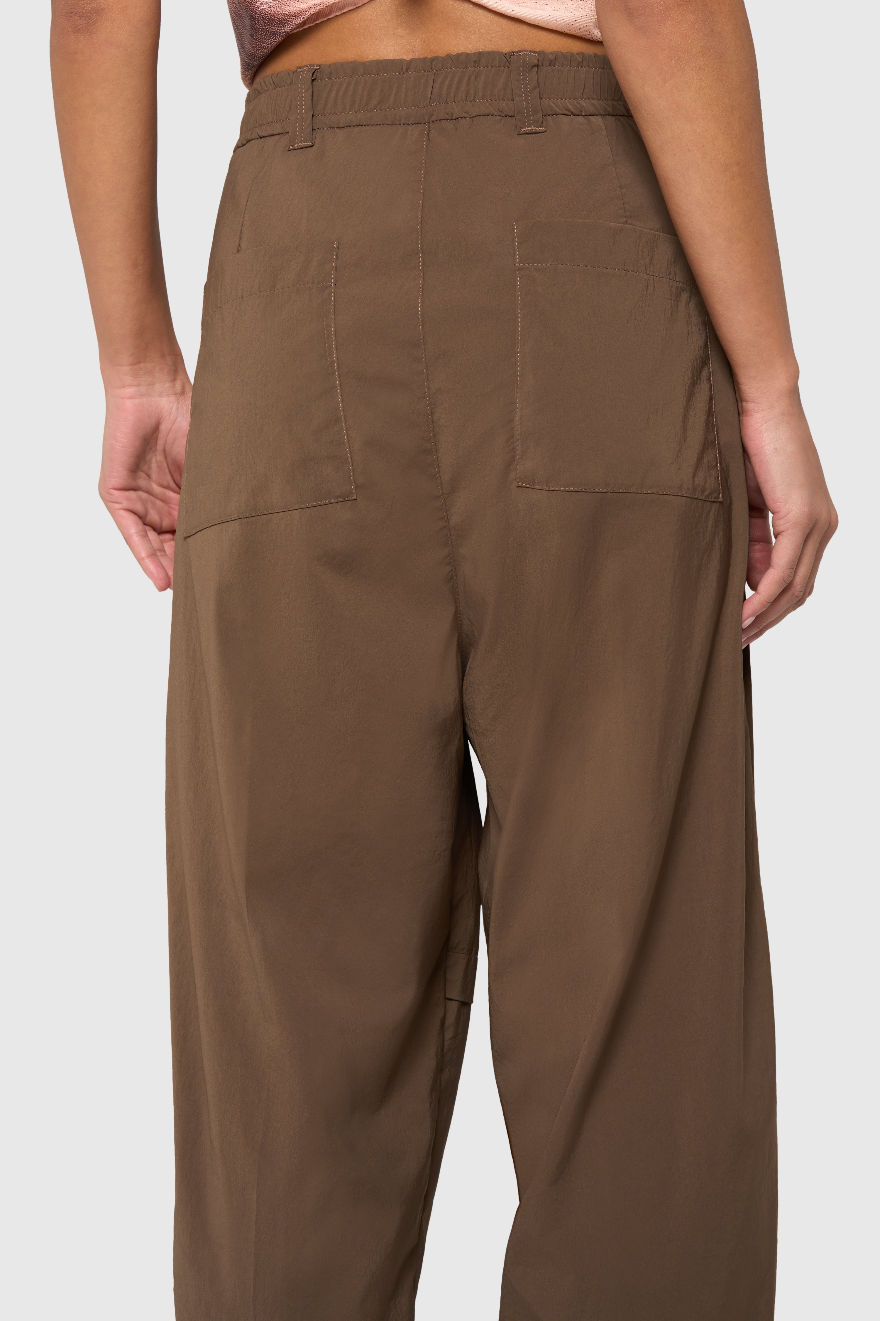 Sand pleated trousers