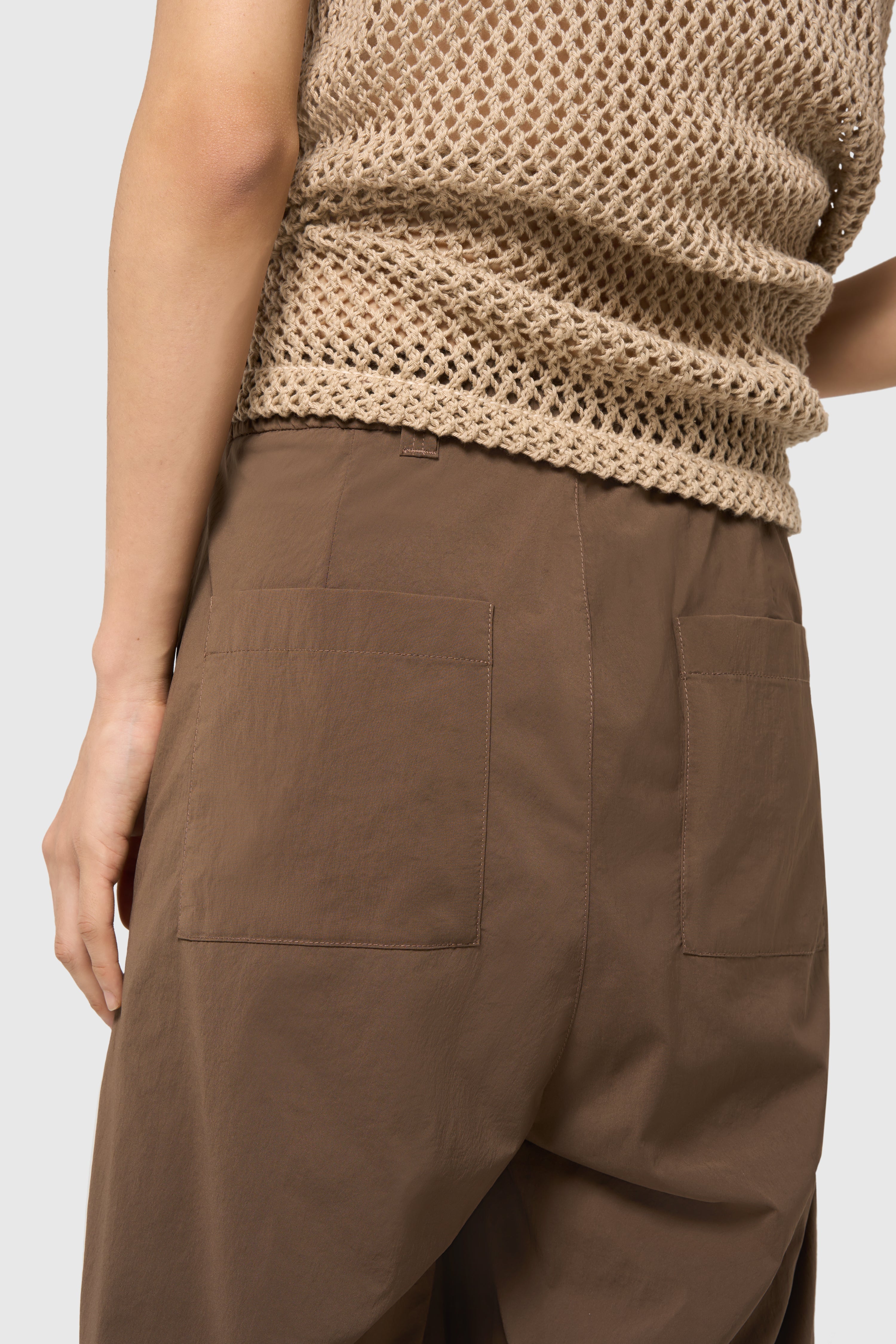 Sand pleated trousers
