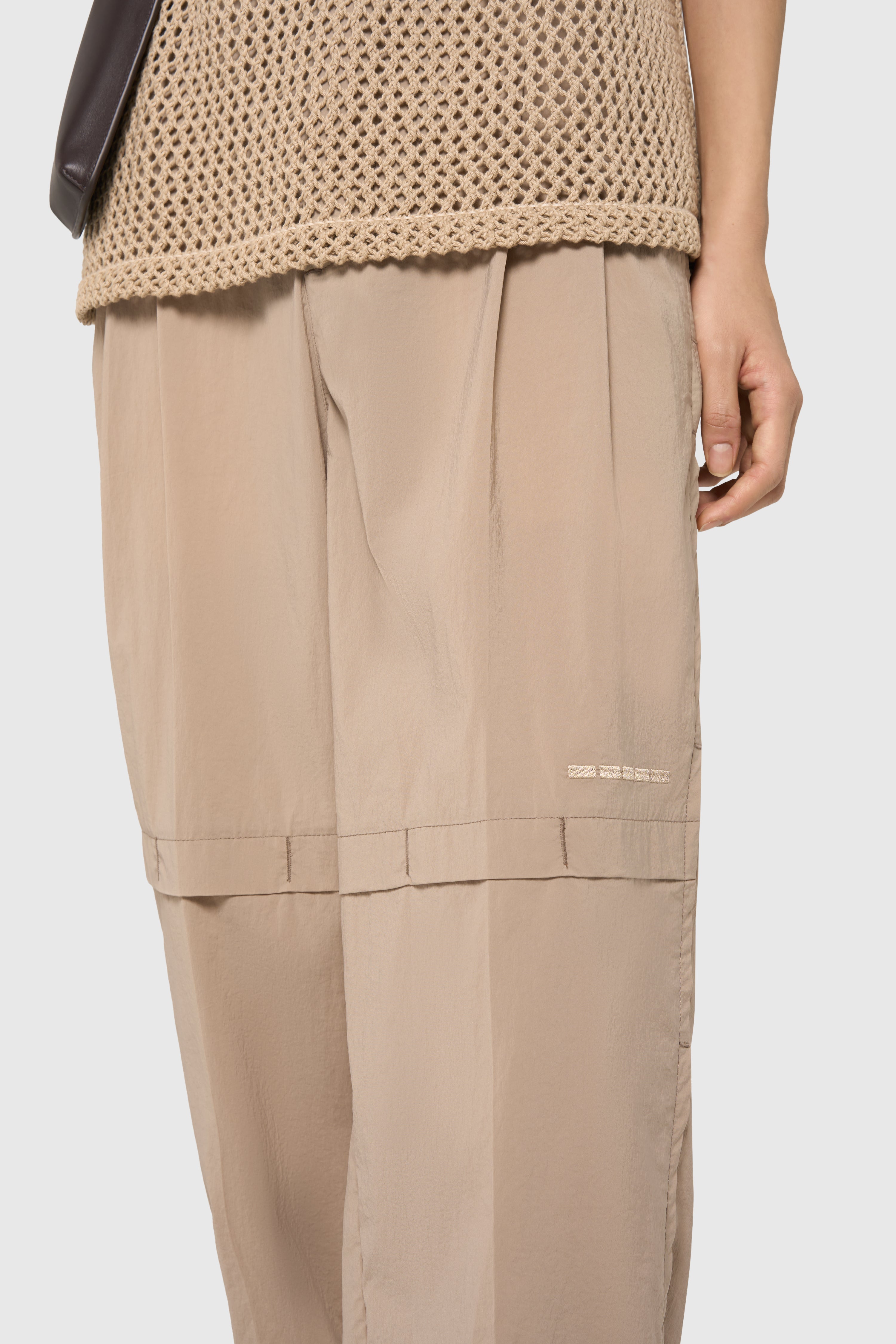Sand pleated trousers