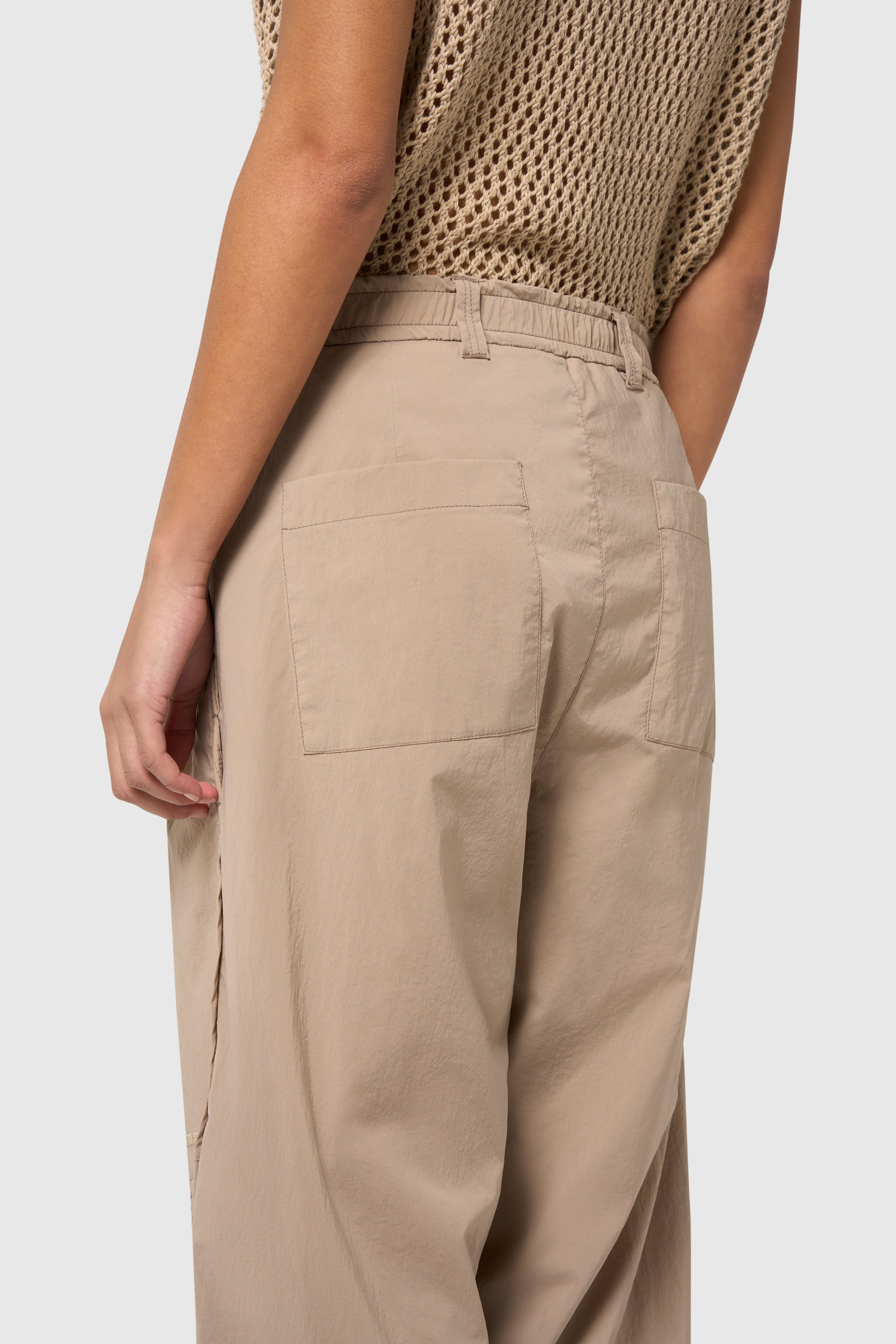 Sand pleated trousers