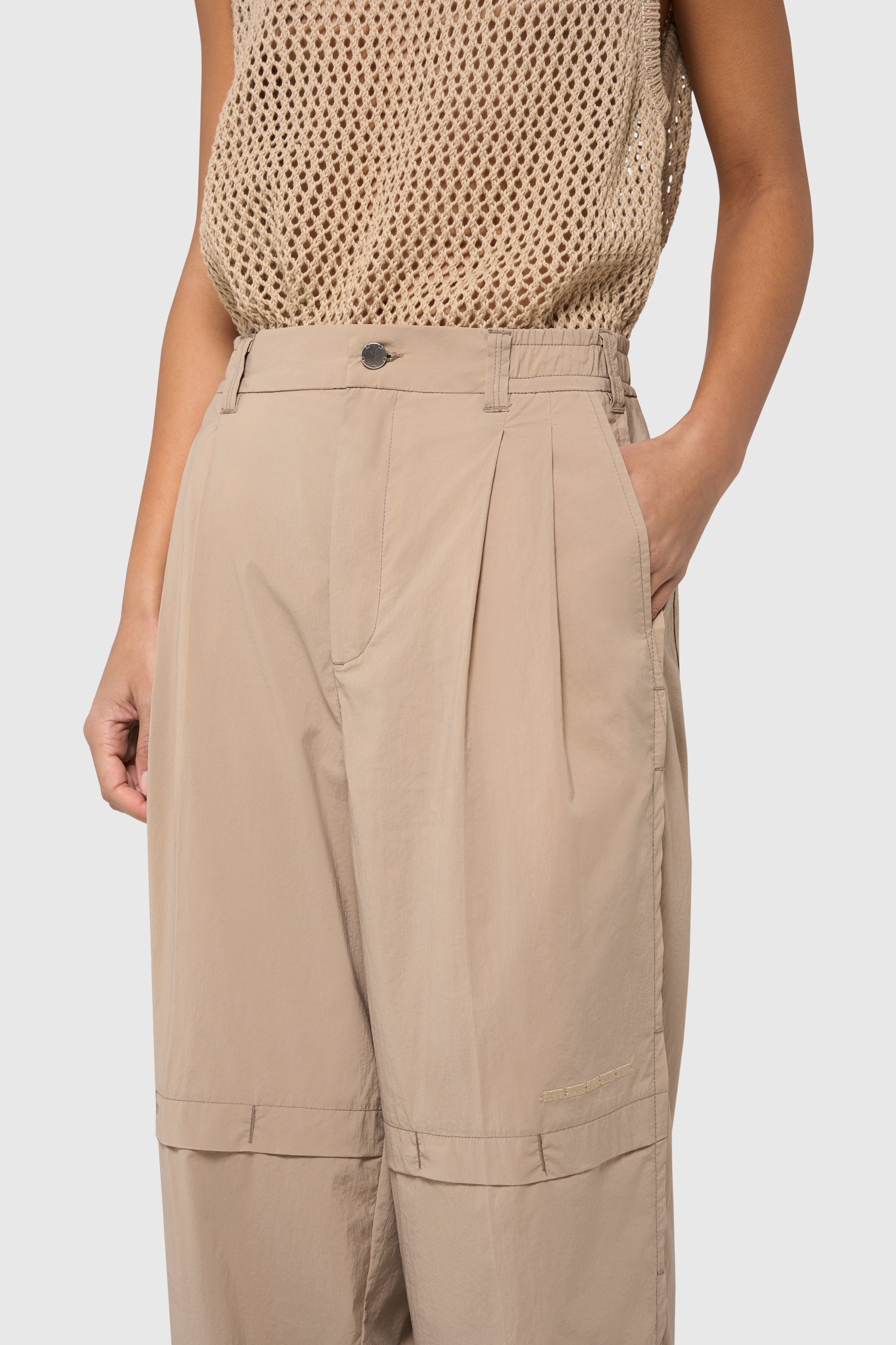 Sand pleated trousers